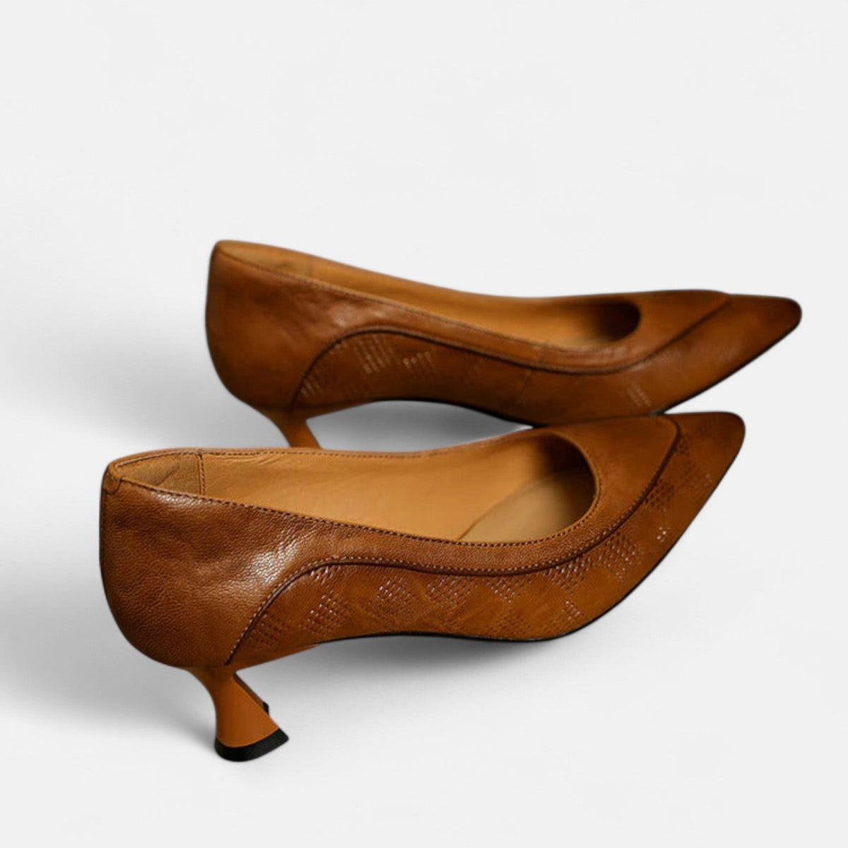 Amara Leder Pumps